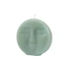 BOUGIE FORME VISAGE 9X2.5X9CM CELADON